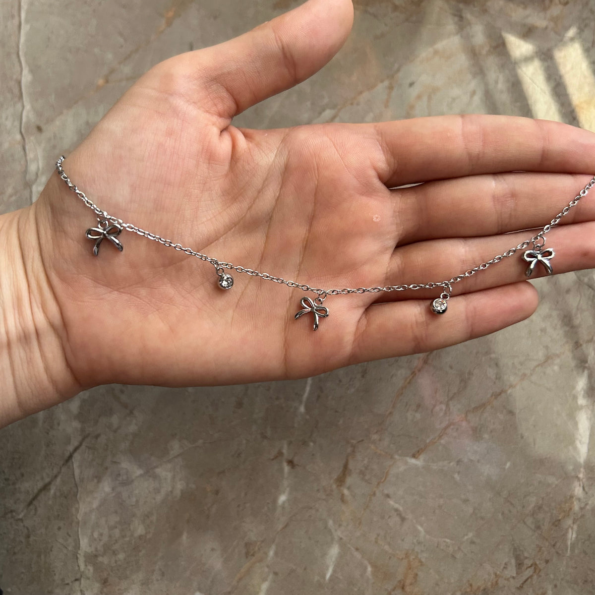 Bow charms necklace